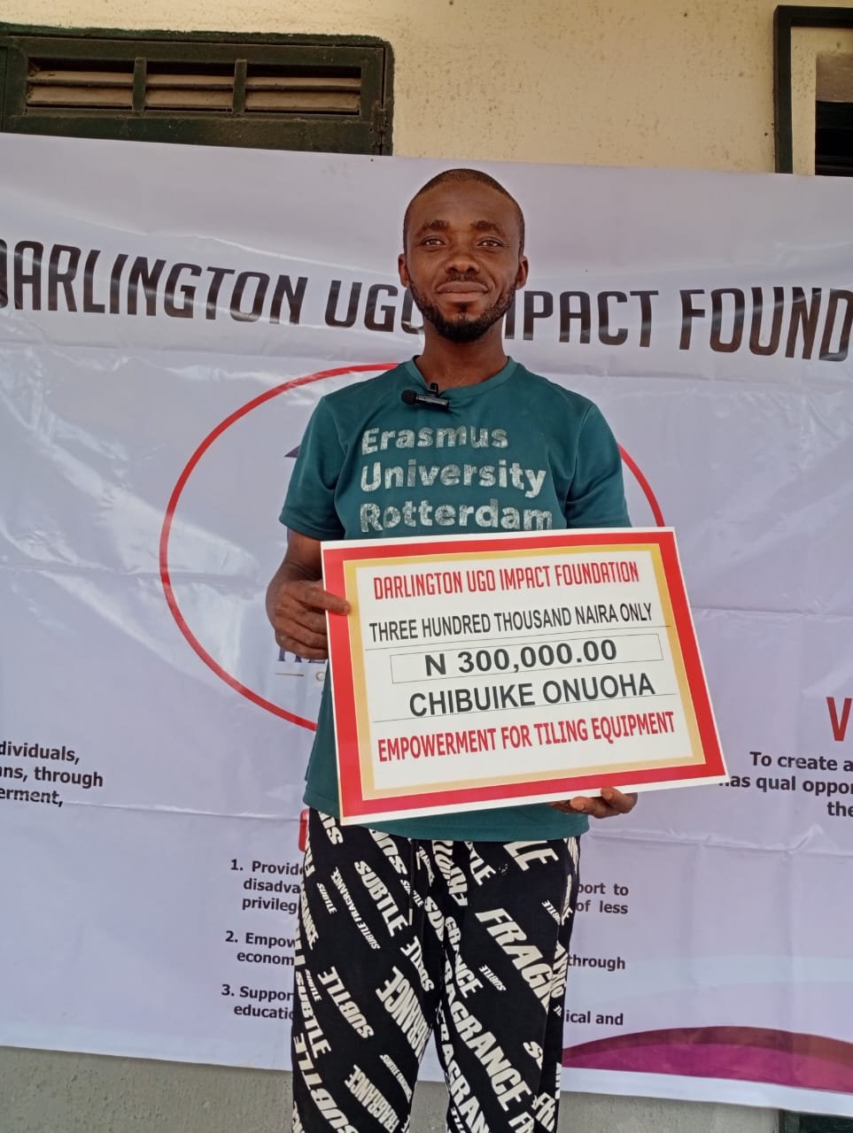 Beneficiary holding a N300,000 grant award