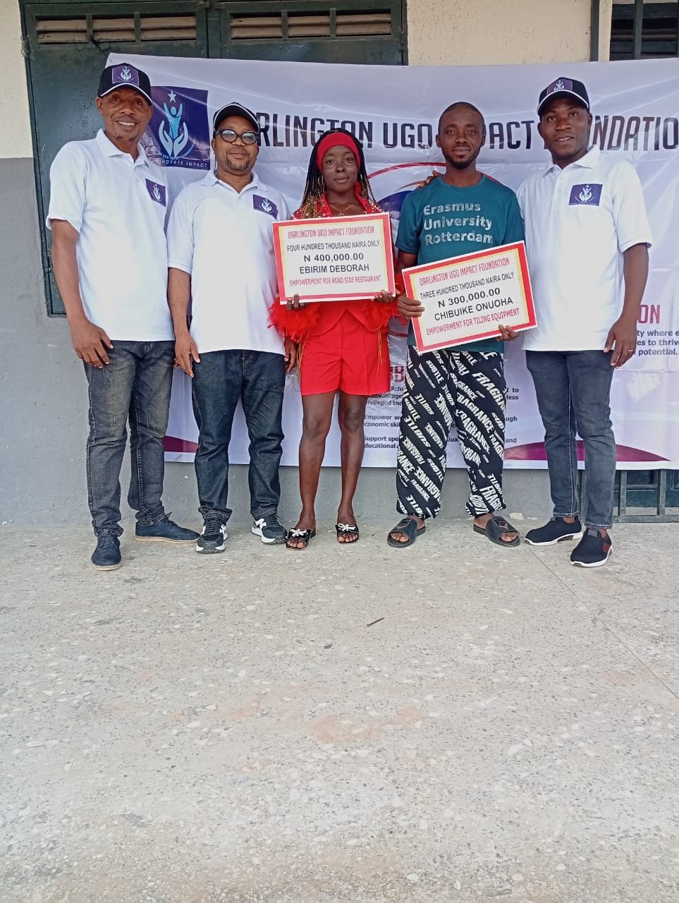 Foundation team with economic empowerment grant beneficiaries