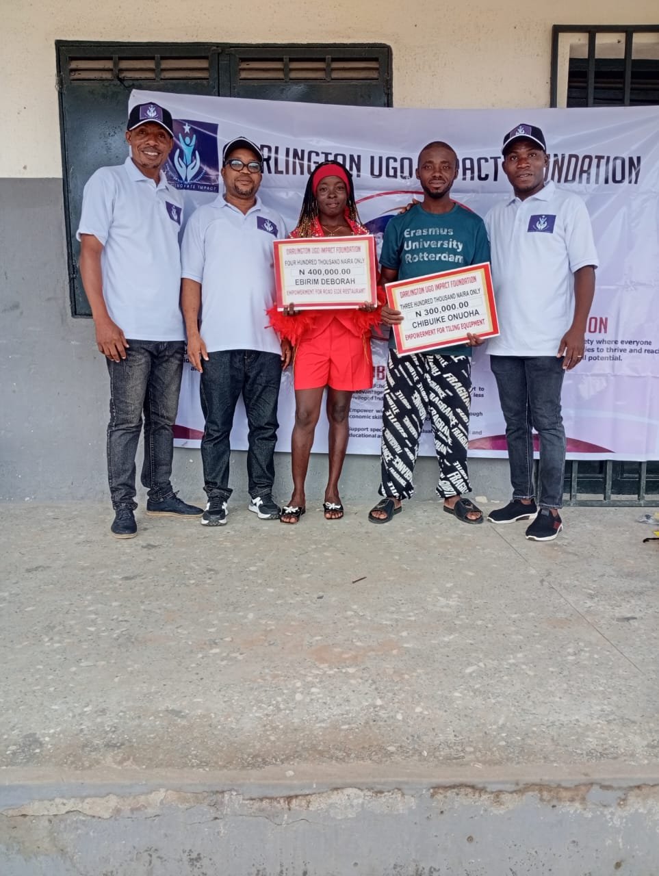 Foundation team with economic empowerment grant beneficiaries