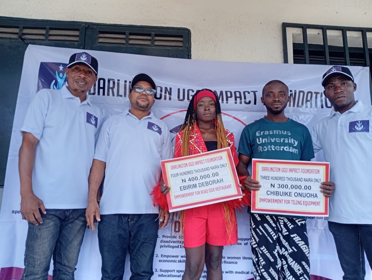 Foundation team with economic empowerment grant beneficiaries