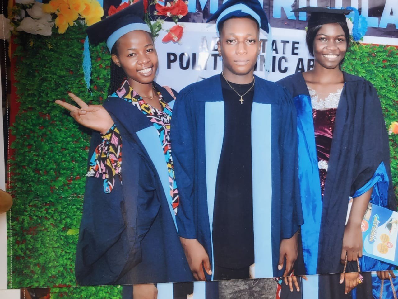 Scholarship beneficiaries in matriculation gowns