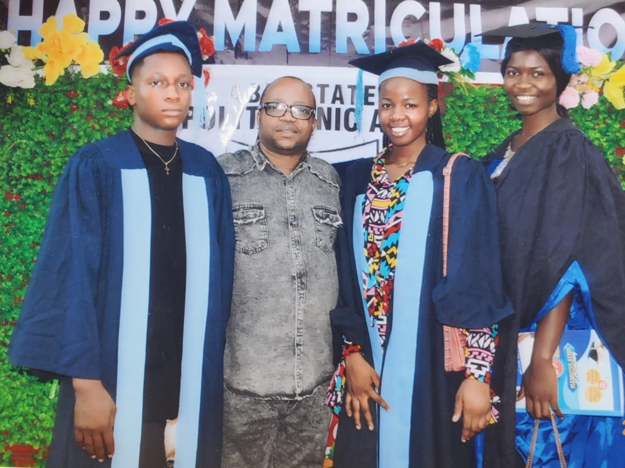 Scholarship beneficiaries in matriculation gowns